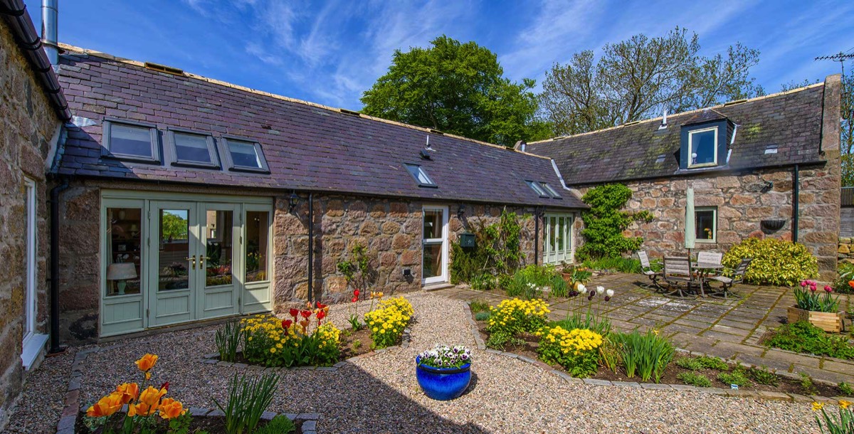 old steading with landscaped patio in Aberdeenshire