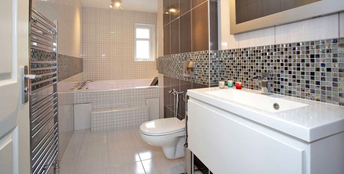 black and white mosaic tiled bathroom