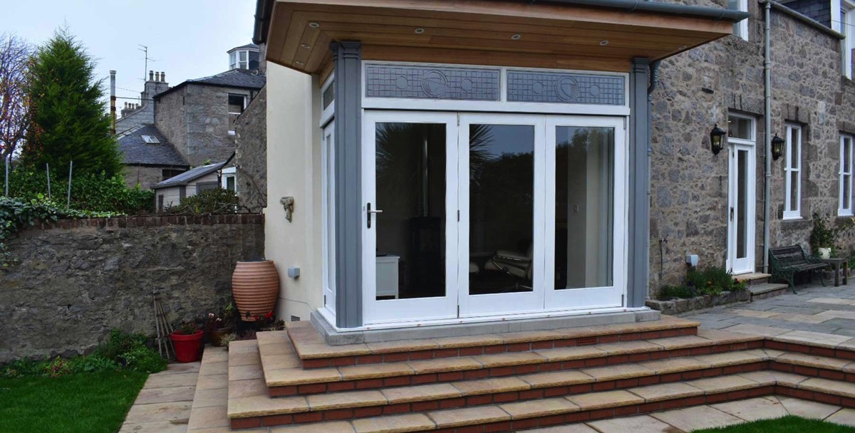 steps leading to new extension in a traditional granite house